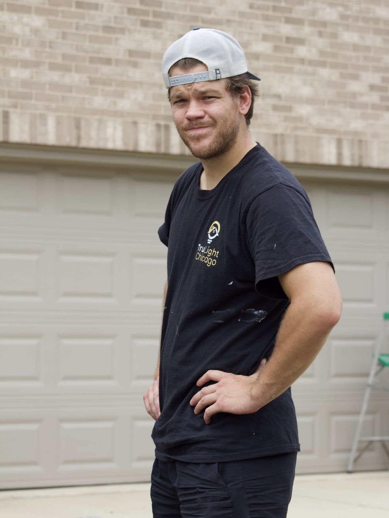 A member of the TruLight Chicago installation team